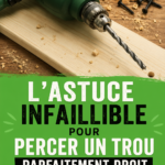 Une personne en train de percer un trou droit avec une perceuse dans un atelier.
