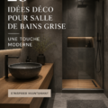 Salle de bain moderne avec des murs gris et des accents blancs